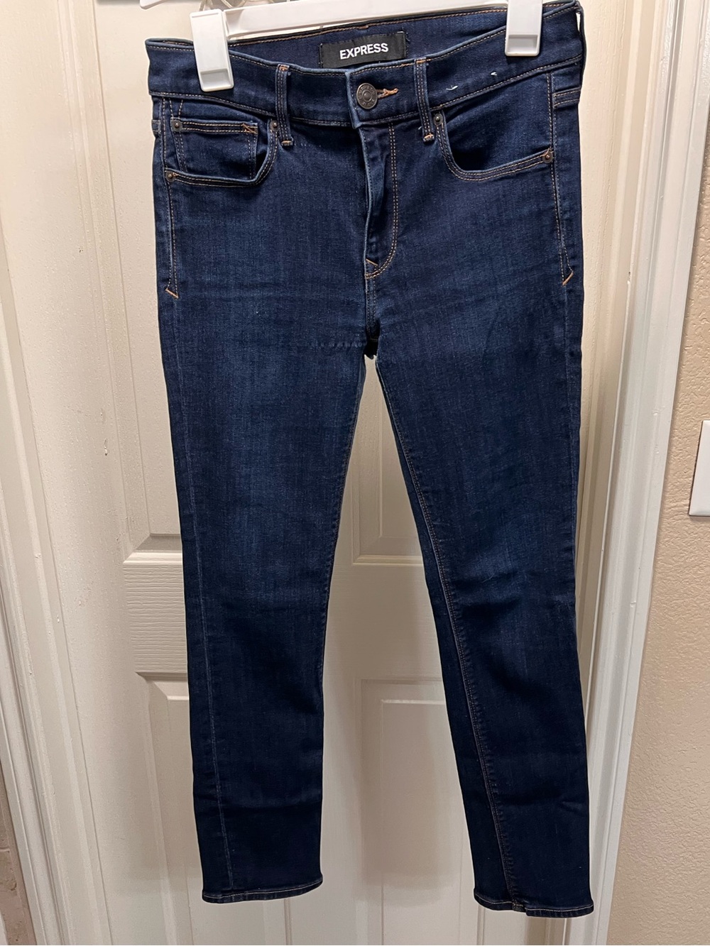 Express Skinny Mid Rise Jeans in Dark Indigo